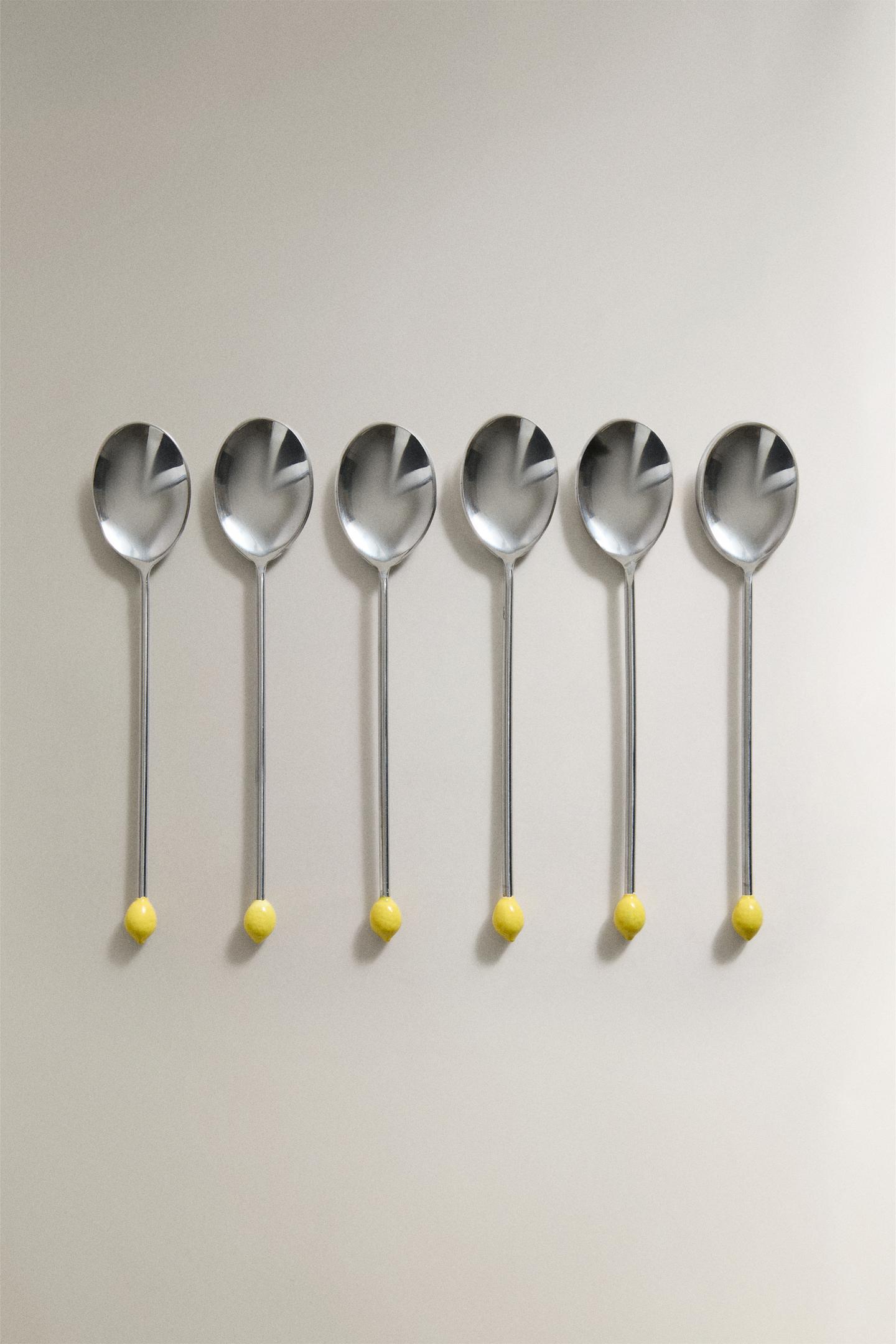 Set of lemon dessert spoons on a table